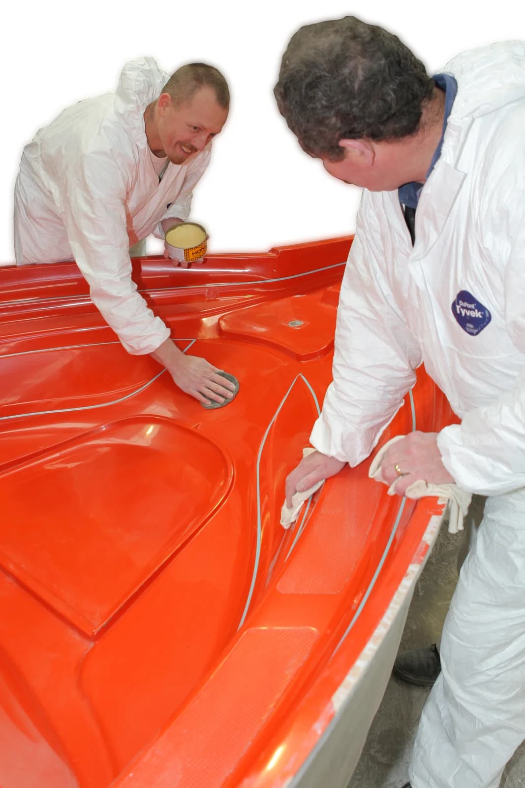 Ocean Master boat-building team working on a hull